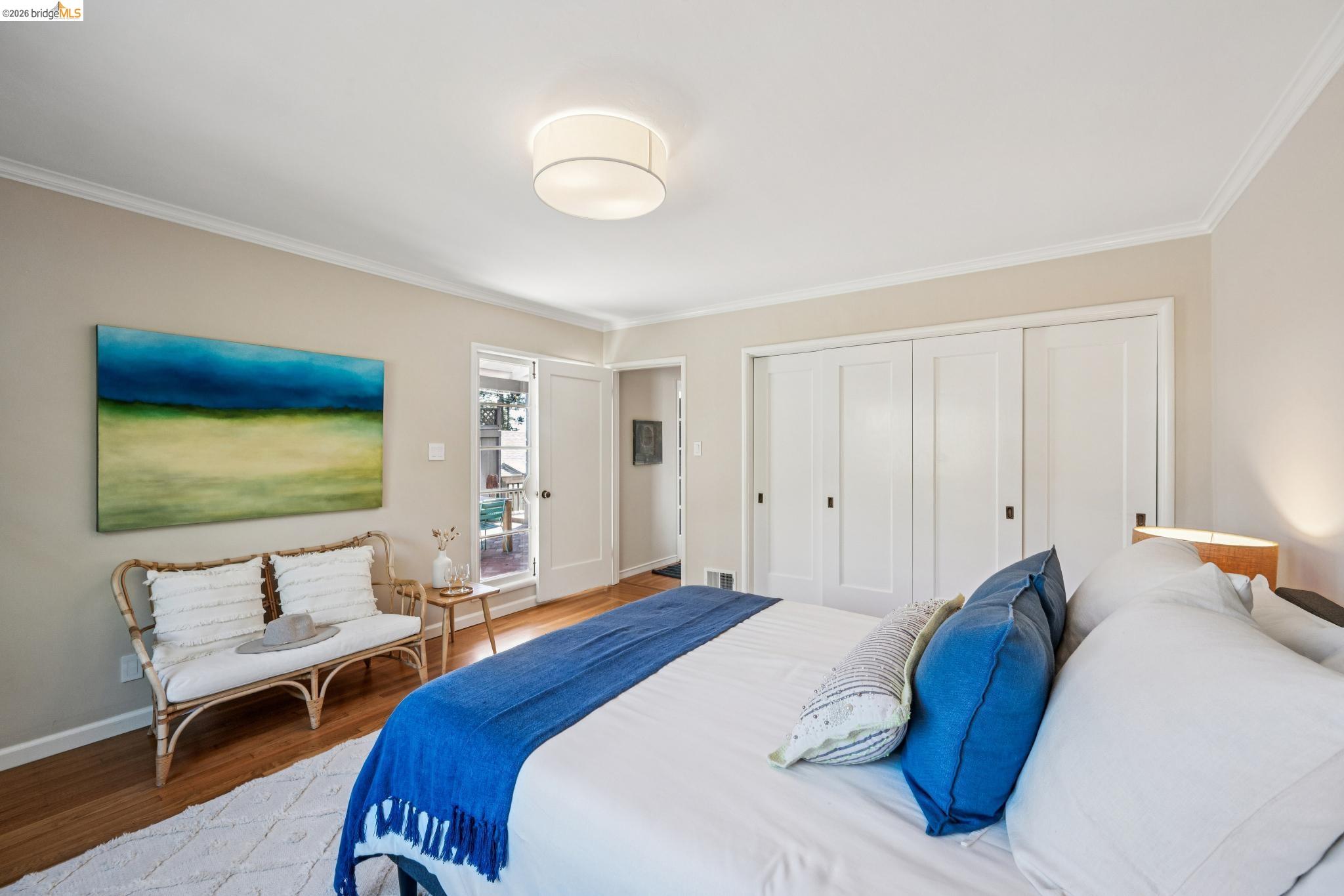 290 Colgate Avenue Kensington, CA 94708 - Photo 34 of 52 Bedroom featuring a closet, wood finished floors, and ornamental molding
