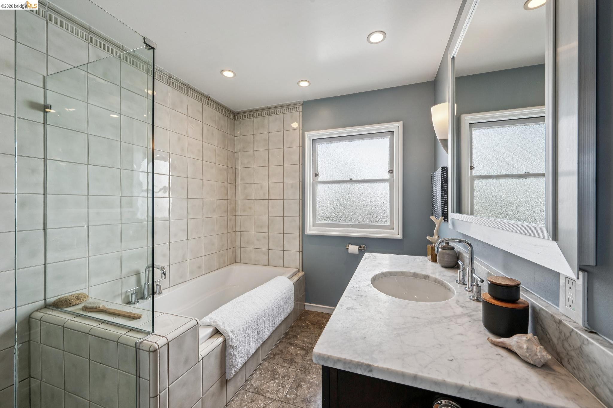 290 Colgate Avenue Kensington, CA 94708 - Photo 35 of 52 Bathroom with vanity, a garden tub, and recessed lighting
