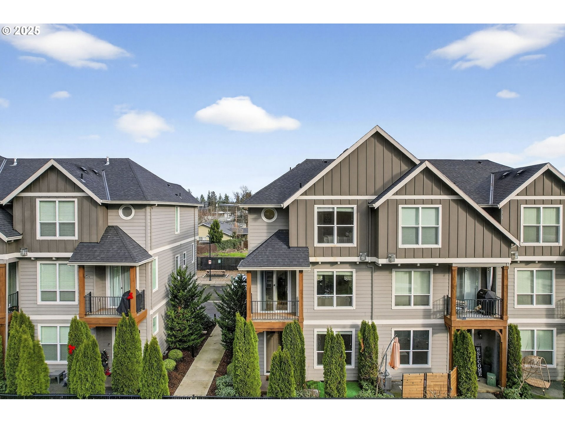 464 Northeast 3rd Avenue Canby, OR 97013 - Photo 1 of 28 a view of a big house with a big yard and large trees