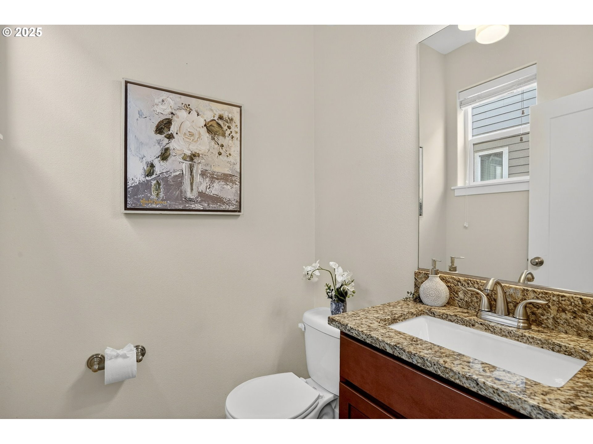 464 Northeast 3rd Avenue Canby, OR 97013 - Photo 14 of 28 a bathroom with a granite countertop sink a toilet and a mirror