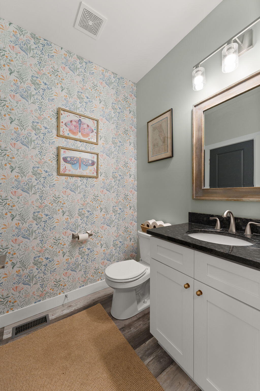 4200 Cardinal Lane Valparaiso, IN 46383 - Photo 6 of 44 a bathroom with a toilet sink and mirror