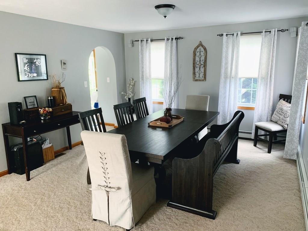 254 Mendon Road Sutton, MA 01590 - Photo 8 of 36 a living room with furniture and wooden floor
