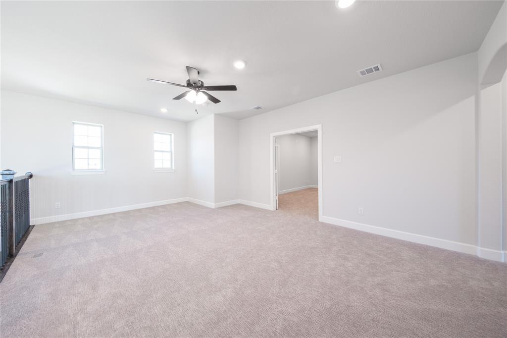 3307 Guardian Angel Court Heath, TX 75126 - Photo 19 of 40 a view of an empty room with a window