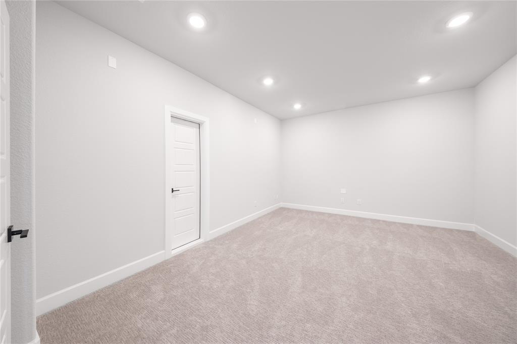 3307 Guardian Angel Court Heath, TX 75126 - Photo 21 of 40 an empty room with a empty space and windows