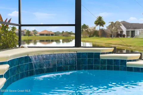 a view of swimming pool from a window