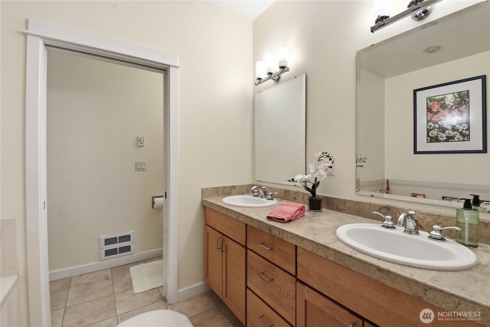 383 Romance Hill Road, Unit C Belfair, WA 98528 - Photo 12 of 25 a bathroom with a granite countertop sink mirror and double