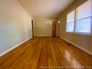 1416 Hibiscus Road Fayetteville, NC 28311 - Photo 7 of 16 a view of an empty room and window