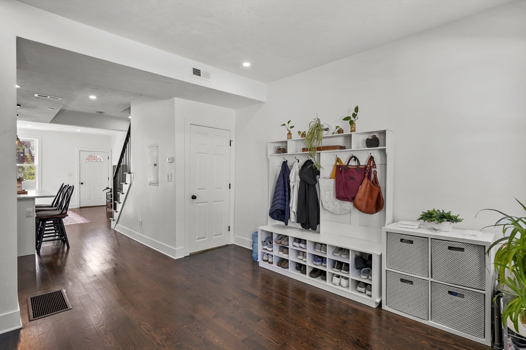 607 Cambridge Street, Unit 4 Worcester, MA 01610 - Photo 12 of 29 a view of a room with furniture and wooden floor
