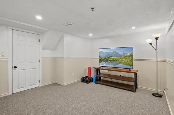 a view of room with furniture