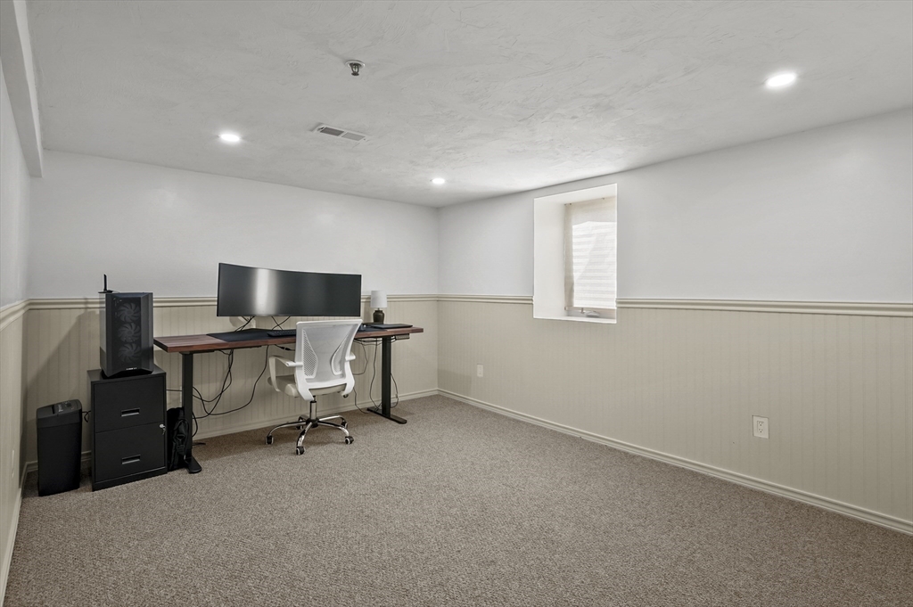 607 Cambridge Street, Unit 4 Worcester, MA 01610 - Photo 21 of 29 a view of a workspace with furniture