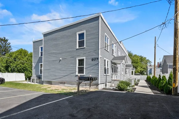 a view of street with parked cars