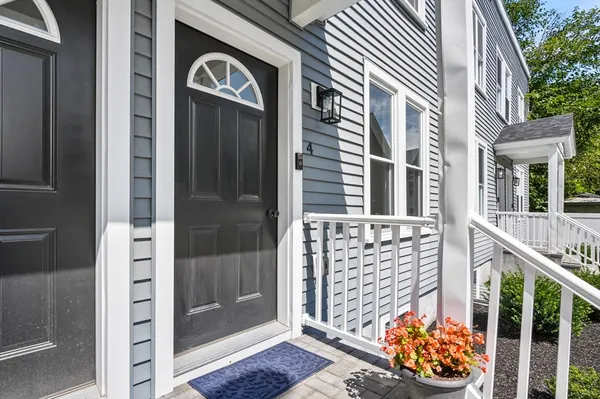 a front view of a house with a glass door