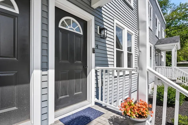 a front view of a house with a glass door