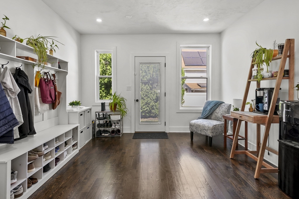 607 Cambridge Street, Unit 4 Worcester, MA 01610 - Photo 10 of 29 a living room with furniture and a flat screen tv