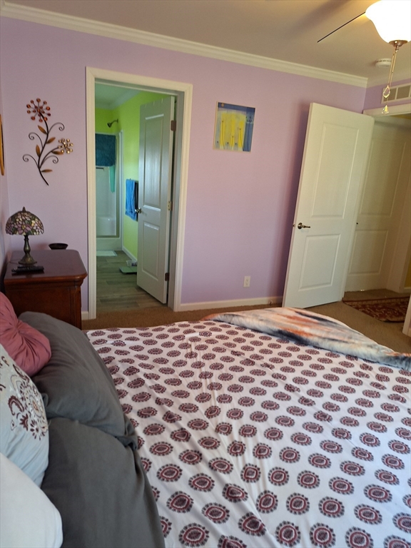 30 Topaz Terrace Gardner, MA 01440 - Photo 12 of 20 a bedroom with a bed and a painting on the wall