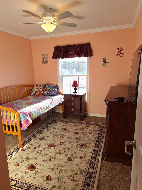30 Topaz Terrace Gardner, MA 01440 - Photo 15 of 20 a bed sitting in a bedroom next to a window