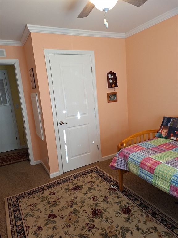 30 Topaz Terrace Gardner, MA 01440 - Photo 16 of 20 a bedroom with a bed and wooden floor