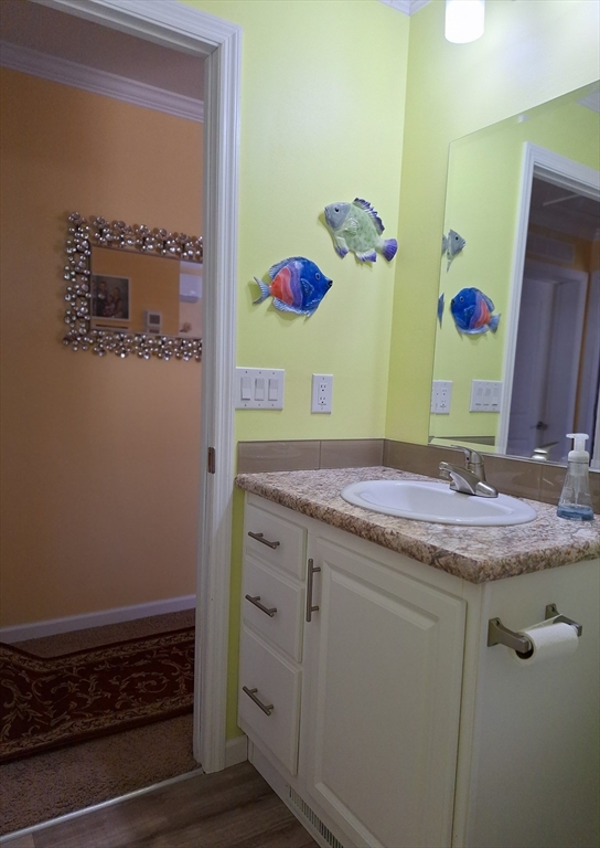 30 Topaz Terrace Gardner, MA 01440 - Photo 18 of 20 a bathroom with a granite countertop sink and a mirror