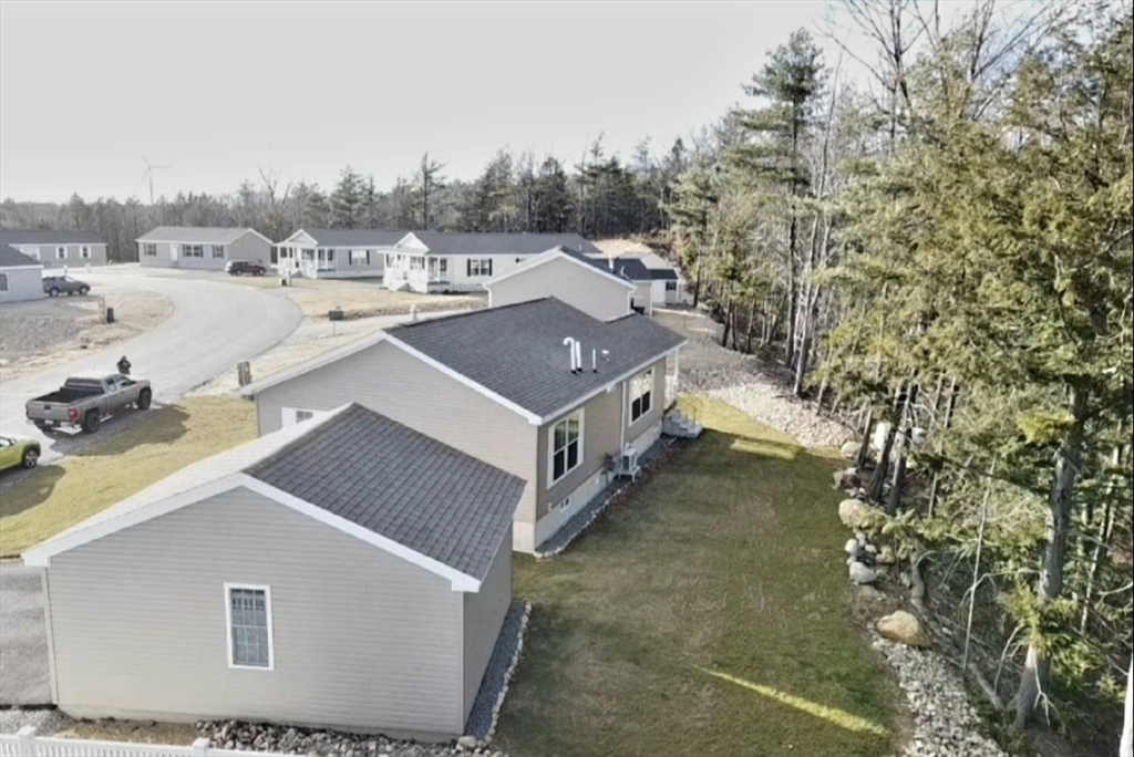 30 Topaz Terrace Gardner, MA 01440 - Photo 4 of 20 a aerial view of a house with a yard big trees