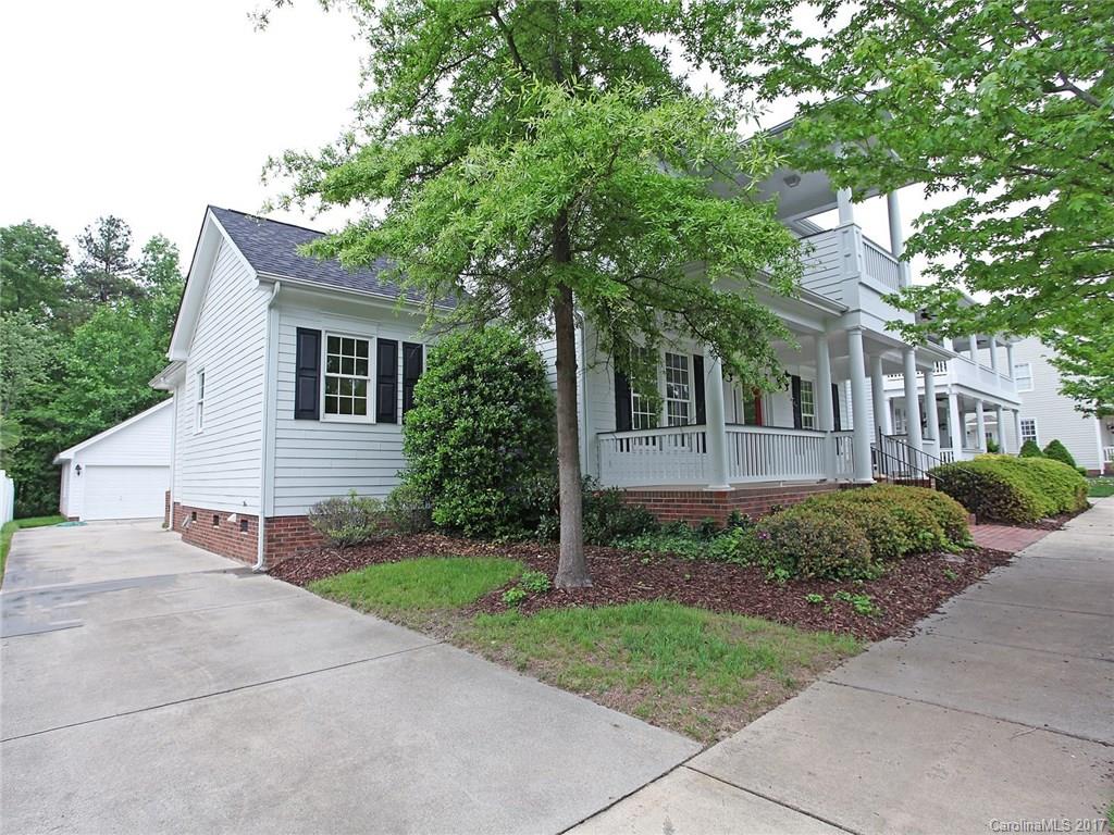 2416 Commons Court Fort Mill, SC 29708 - Photo 2 of 24 a view of a house with a yard