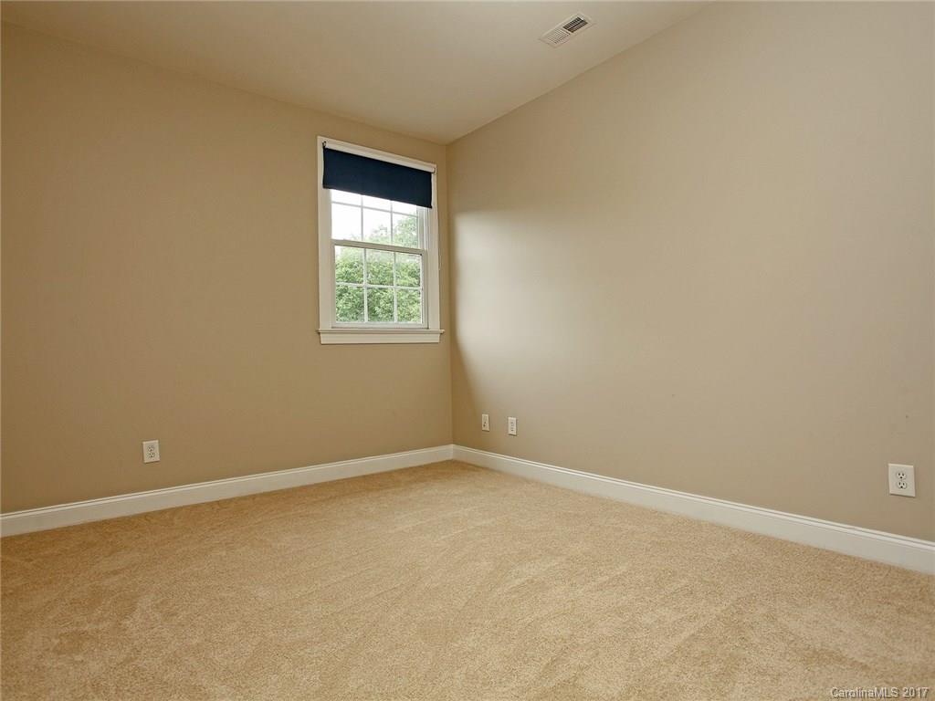 2416 Commons Court Fort Mill, SC 29708 - Photo 20 of 24 an empty room with a window