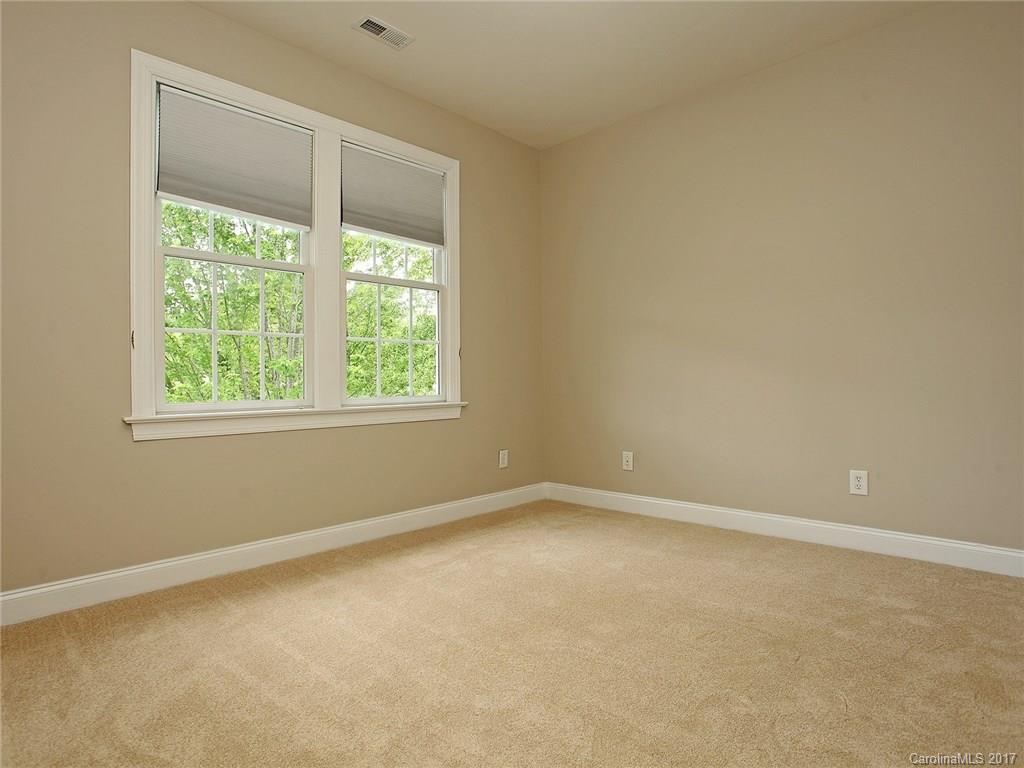 2416 Commons Court Fort Mill, SC 29708 - Photo 21 of 24 an empty room with a window