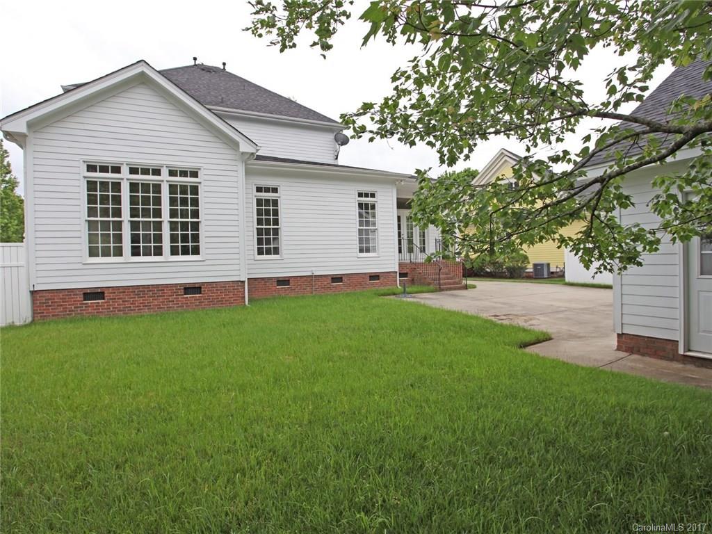 2416 Commons Court Fort Mill, SC 29708 - Photo 6 of 24 a front view of house with yard and green space