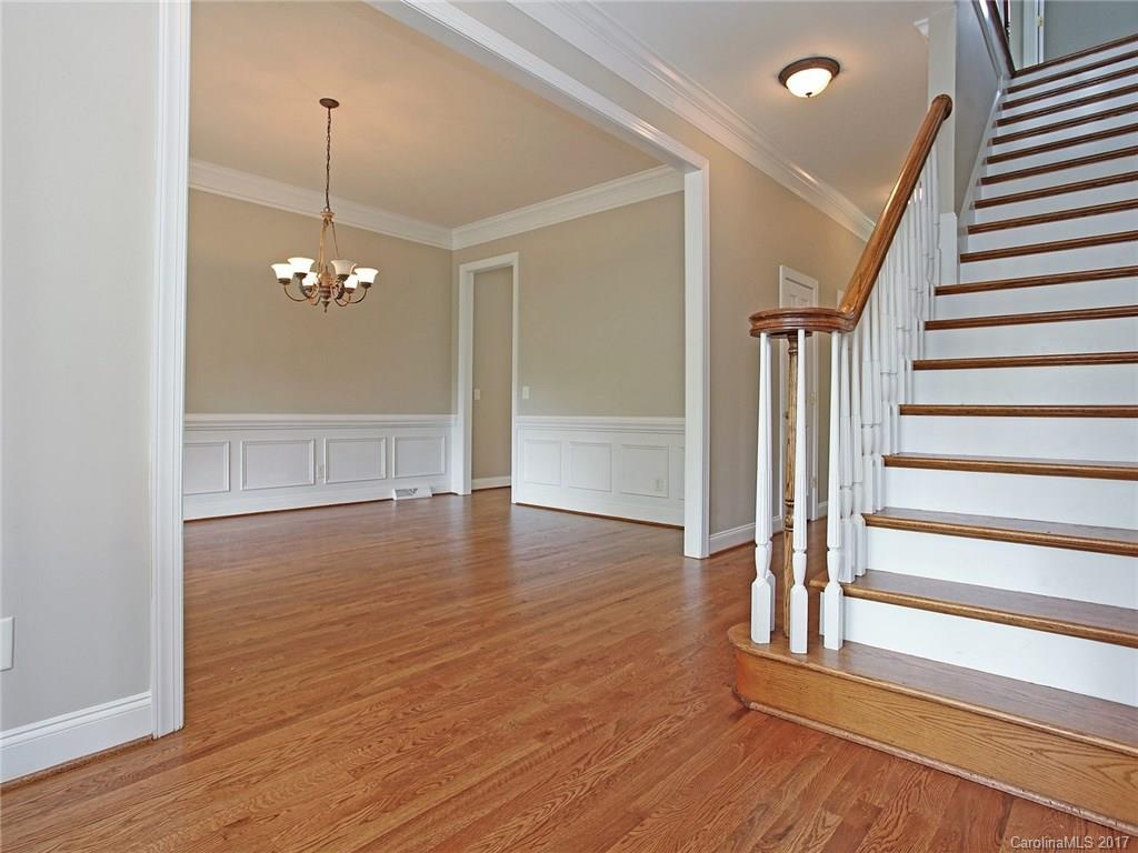 2416 Commons Court Fort Mill, SC 29708 - Photo 7 of 24 a view of a livingroom with wooden floor