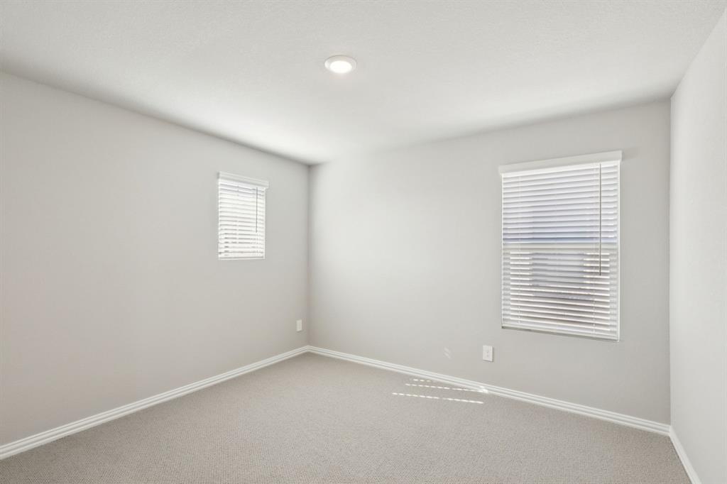 1729 Arches Road Anna, TX 75409 - Photo 19 of 27 an empty room with a window