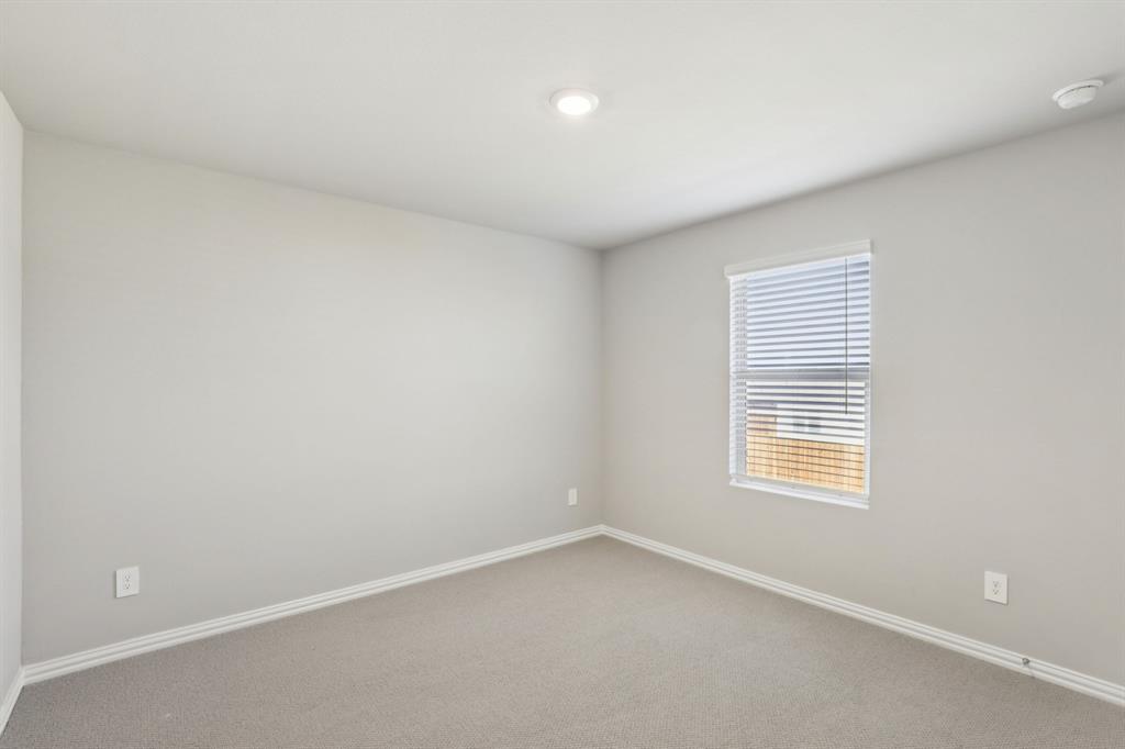 1729 Arches Road Anna, TX 75409 - Photo 22 of 27 an empty room with a window