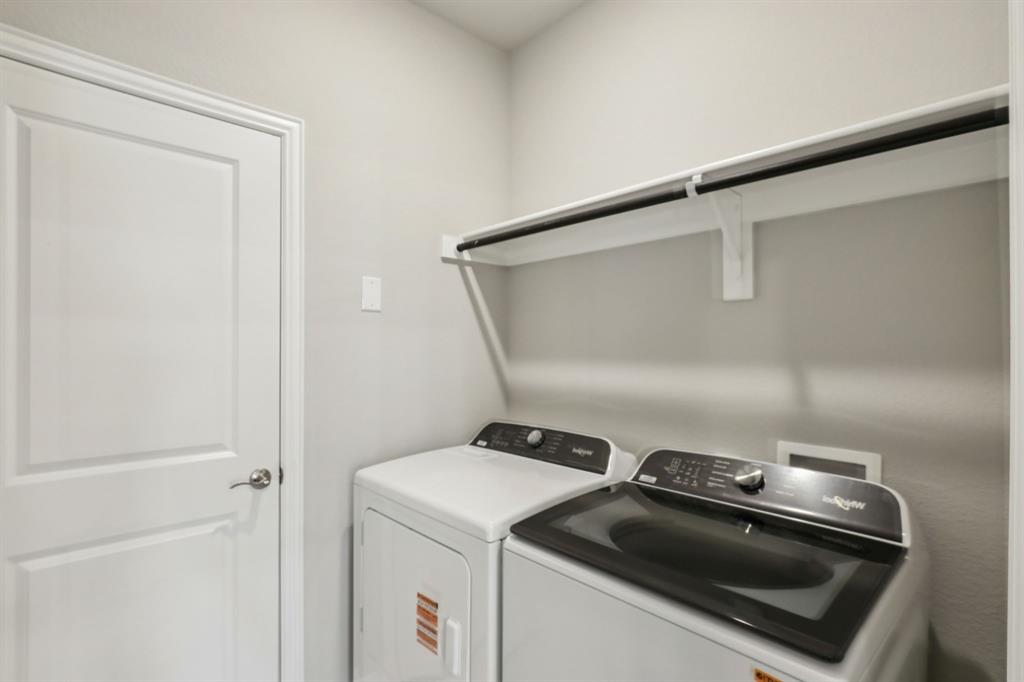 1729 Arches Road Anna, TX 75409 - Photo 10 of 27 a utility room with dryer and washer