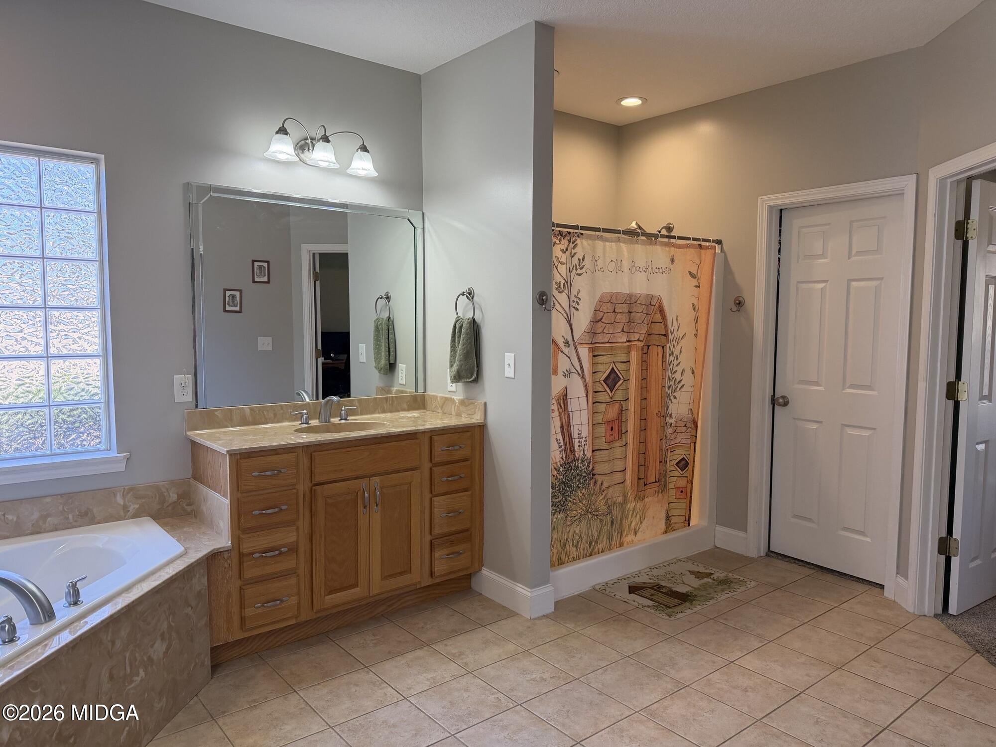 159 Jockey Lane Cochran, GA 31014 - Photo 17 of 39 a bathroom with a double vanity sink mirror and double