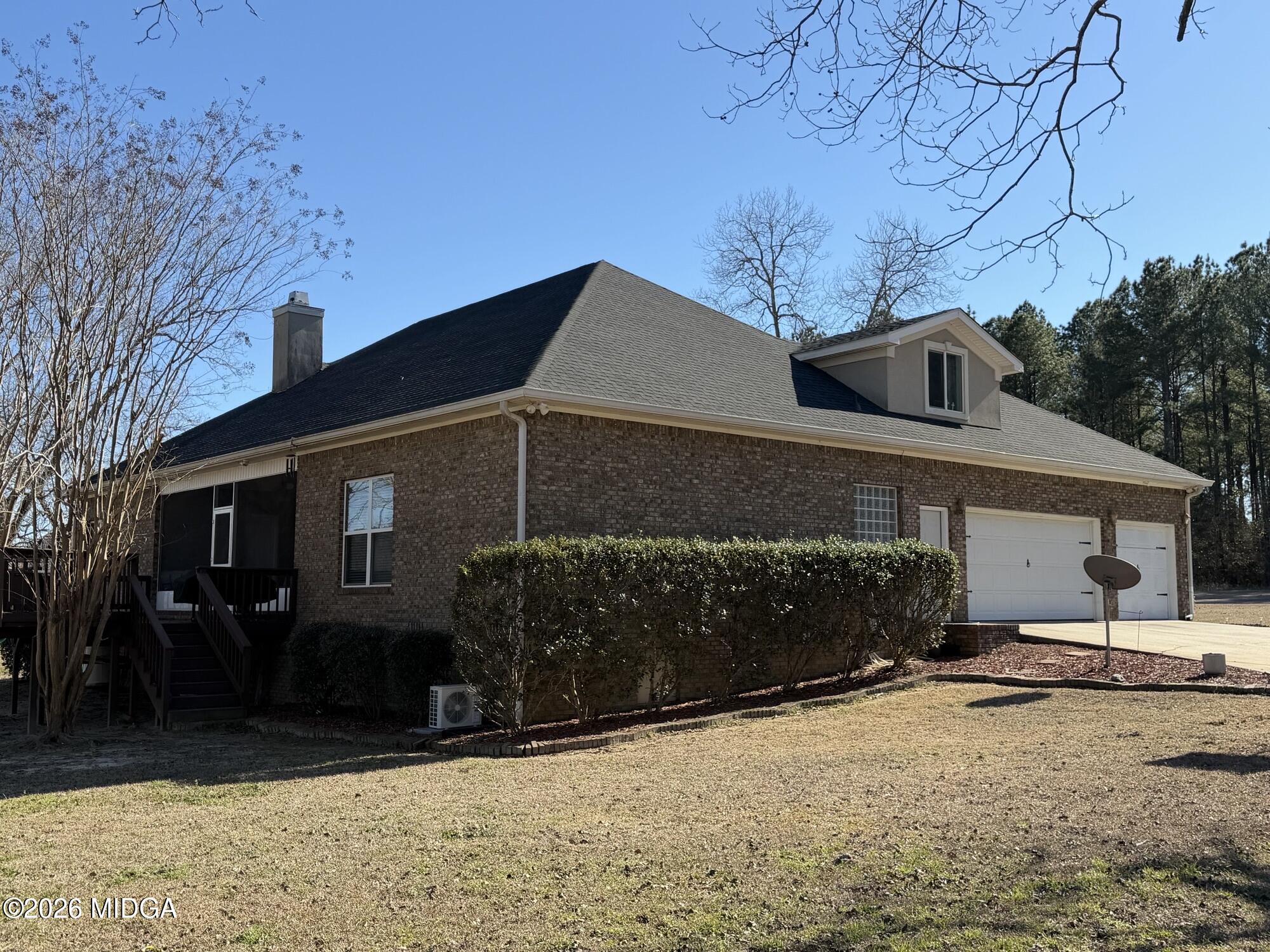 159 Jockey Lane Cochran, GA 31014 - Photo 30 of 39 a front view of a house with a yard
