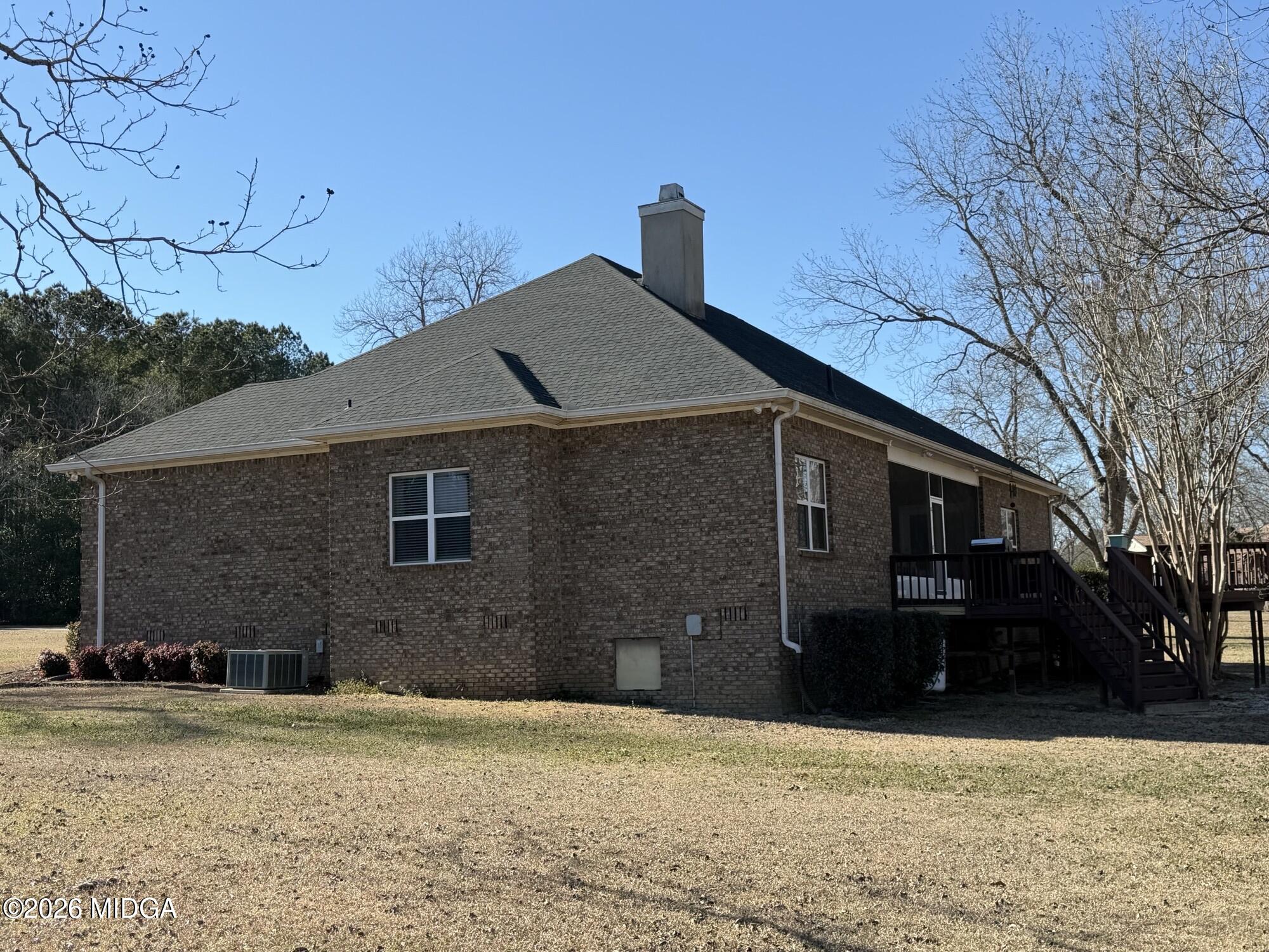 159 Jockey Lane Cochran, GA 31014 - Photo 32 of 39 a front view of a house with a yard