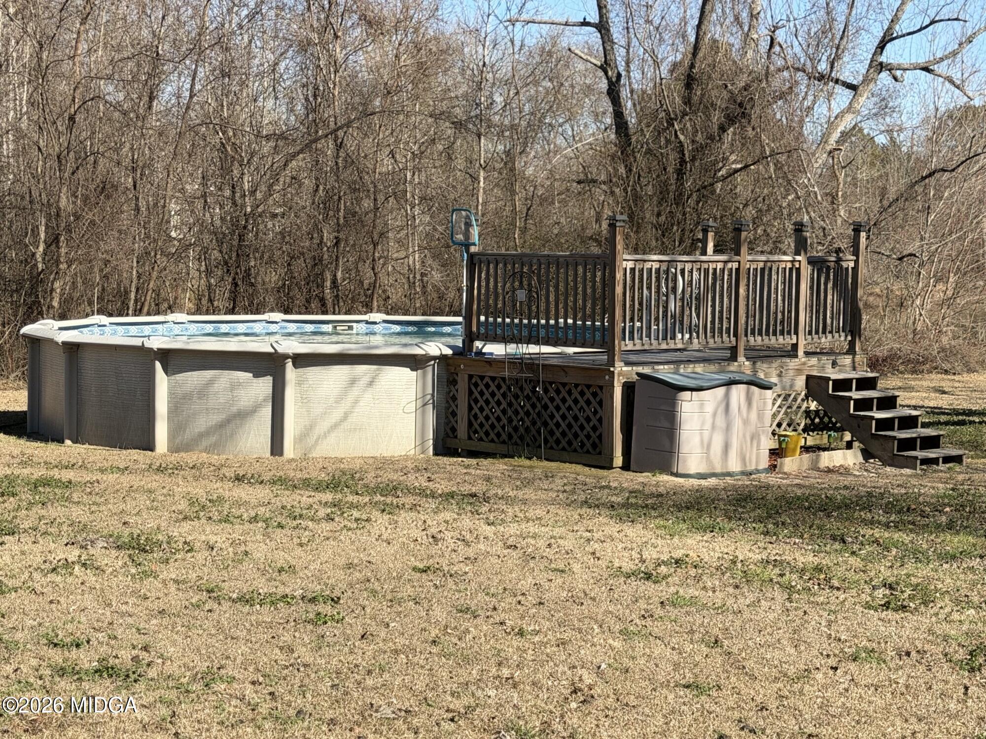 159 Jockey Lane Cochran, GA 31014 - Photo 33 of 39 a view of a terrace with trees