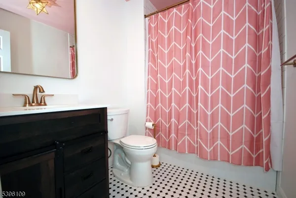 a bathroom with a sink and a toilet