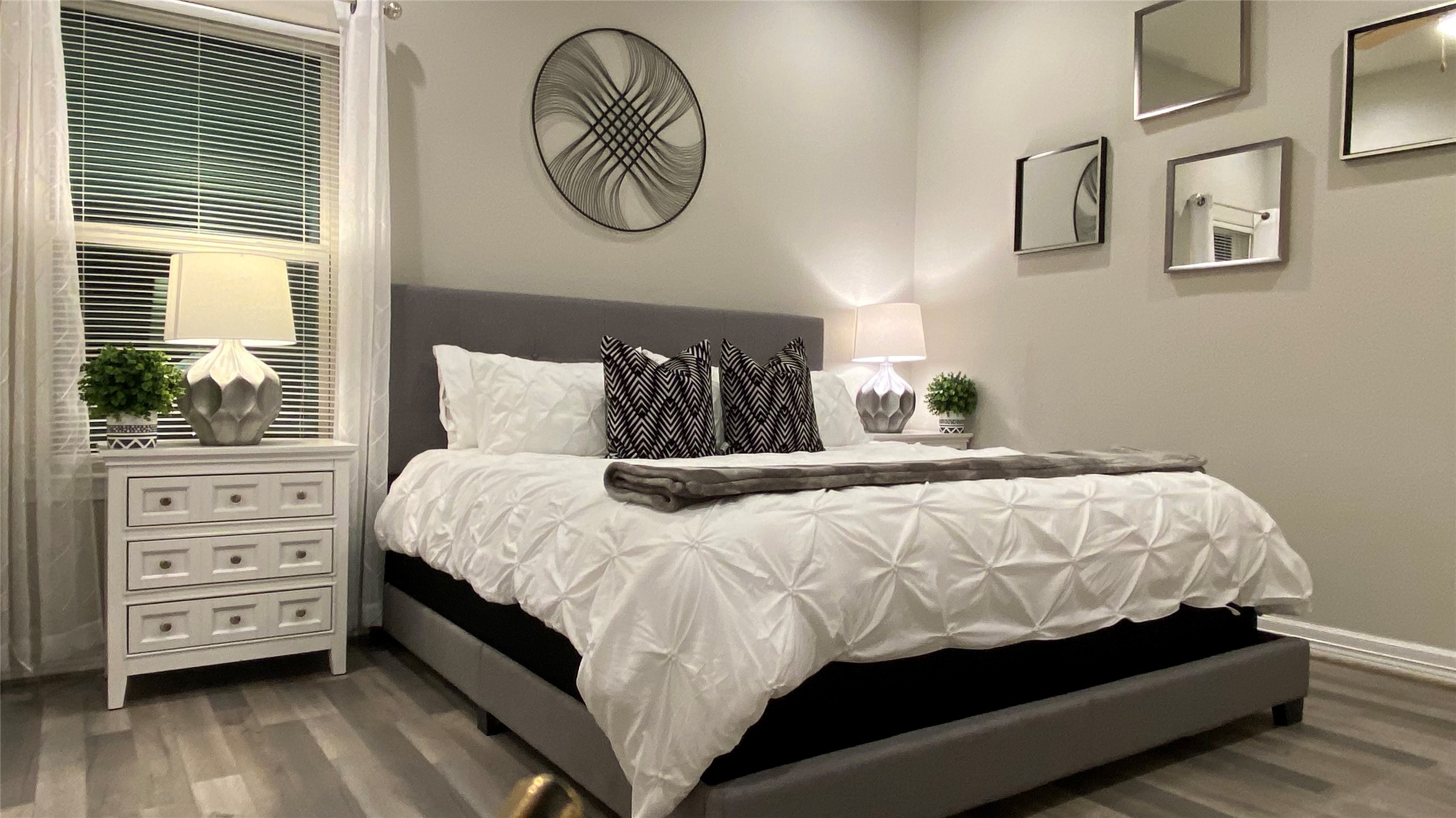 3144 Southmore Boulevard, Unit 4 Houston, TX 77004 - Photo 7 of 10 a bedroom with a bed and a window