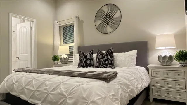 a bedroom with a bed and a closet