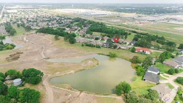 a view of a lake with a city