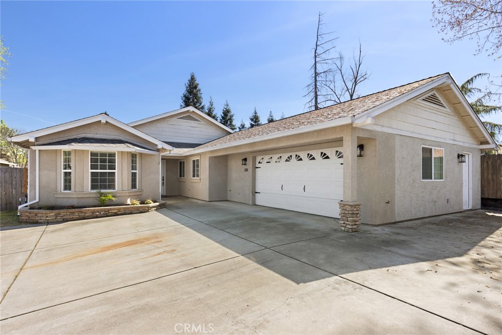 596 Desiree Lane Chico, CA 95973 - Photo 1 of 1 a front view of a house with a garage