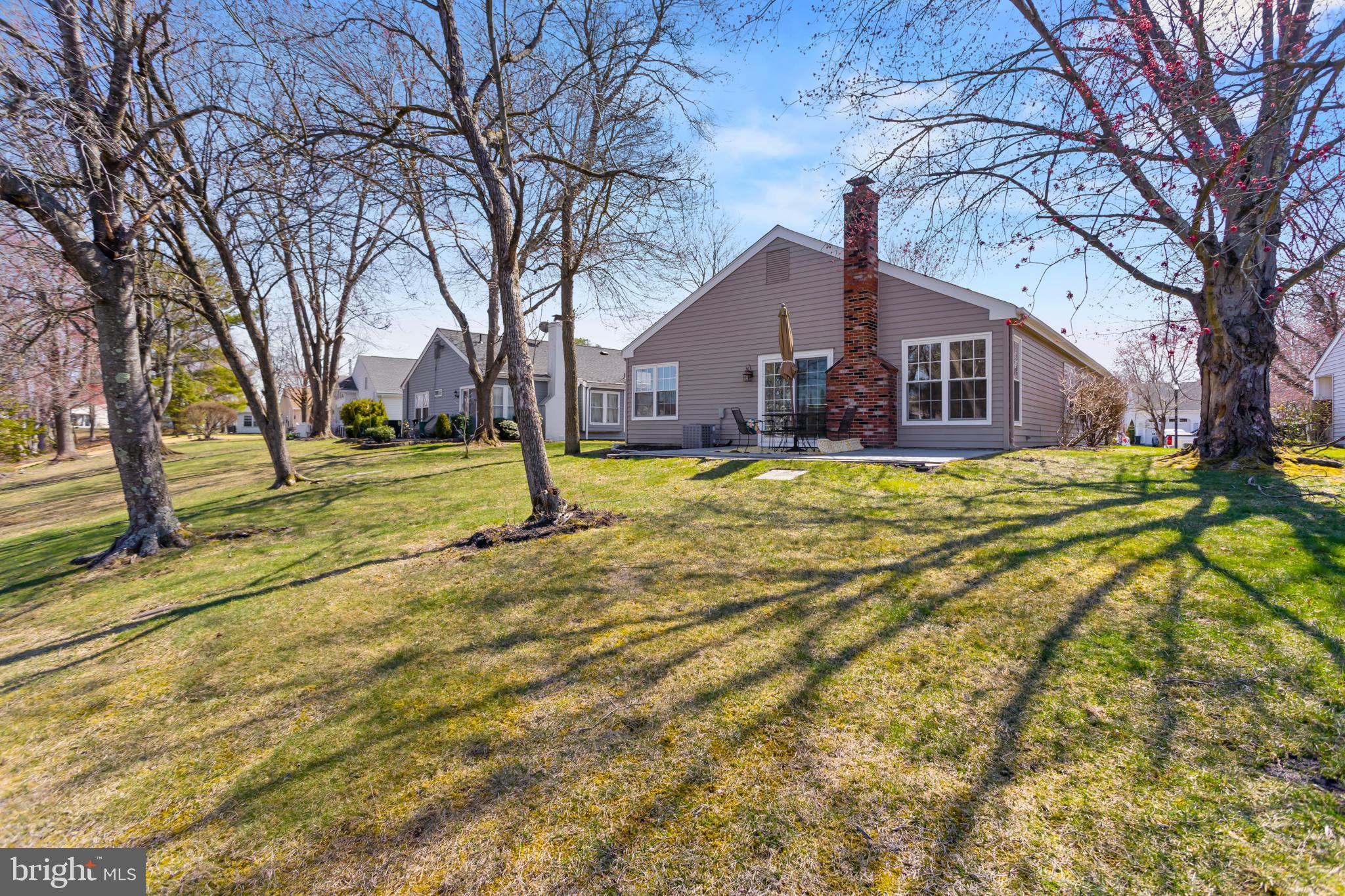 40 Dunstable Road Southampton, NJ 08088 - Photo 23 of 30 a view of a house with a yard covered in snow