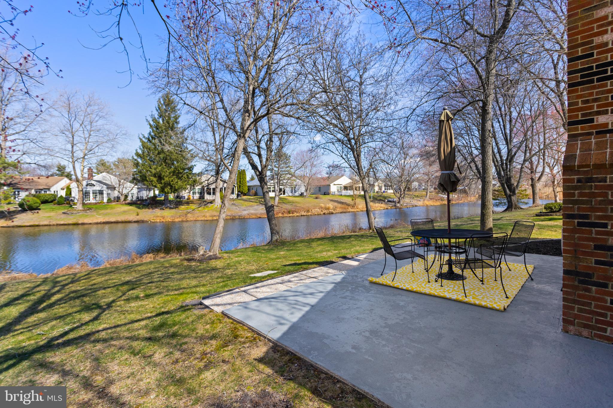 40 Dunstable Road Southampton, NJ 08088 - Photo 4 of 30 a view of a lake with houses with outdoor space