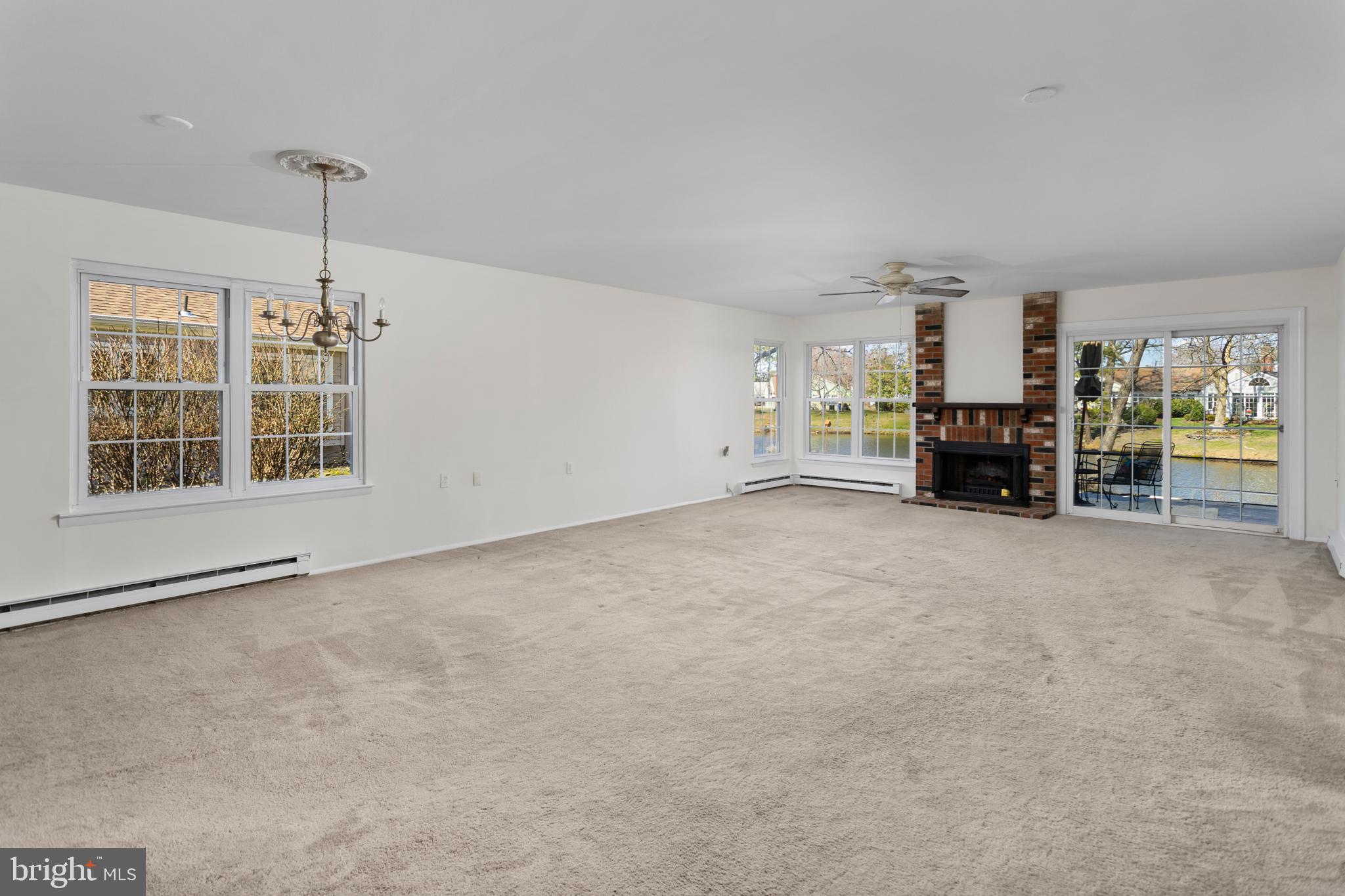 40 Dunstable Road Southampton, NJ 08088 - Photo 8 of 30 a view of empty room with furniture and a fireplace