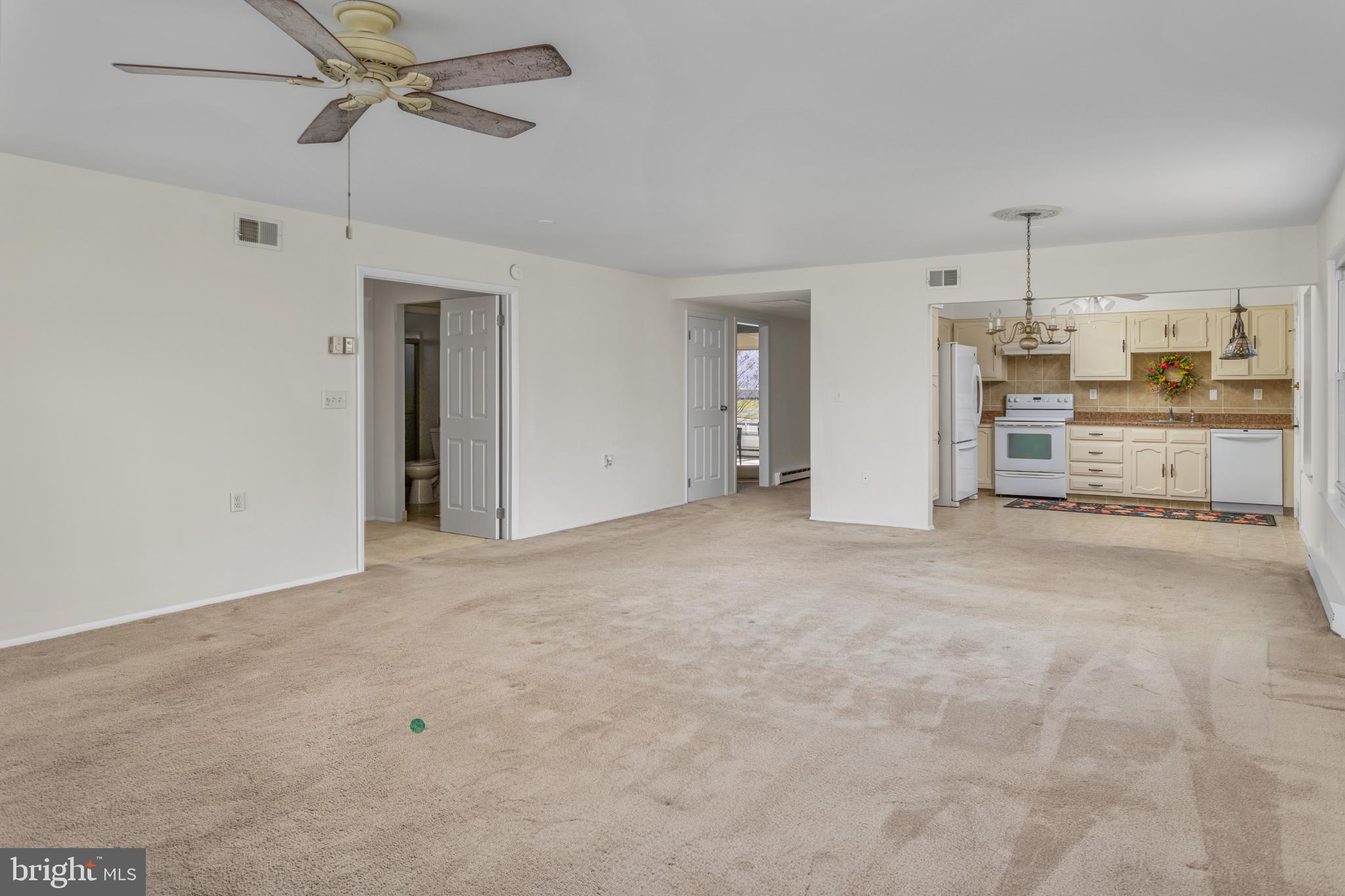 40 Dunstable Road Southampton, NJ 08088 - Photo 9 of 30 a view of a kitchen with cabinet and a window