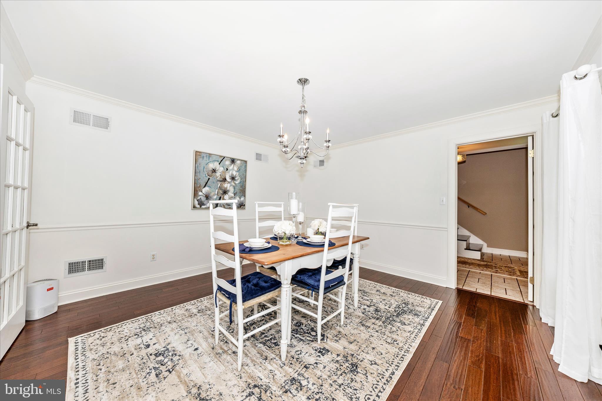 15810 Spade Road Hagerstown, MD 21740 - Photo 4 of 76 a view of a dining room with furniture and wooden floor