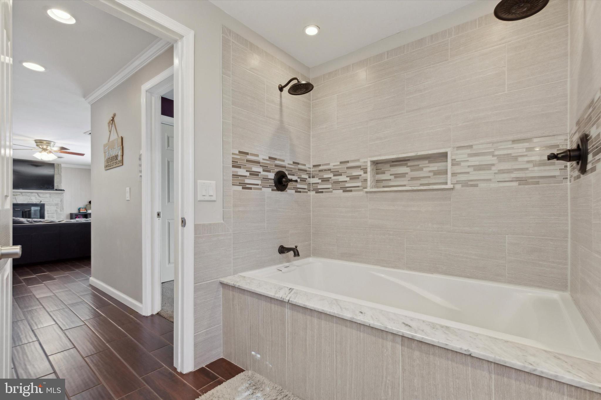 526 Hunsicker Road Telford, PA 18969 - Photo 23 of 35 a bathroom with a tub a sink and a shower