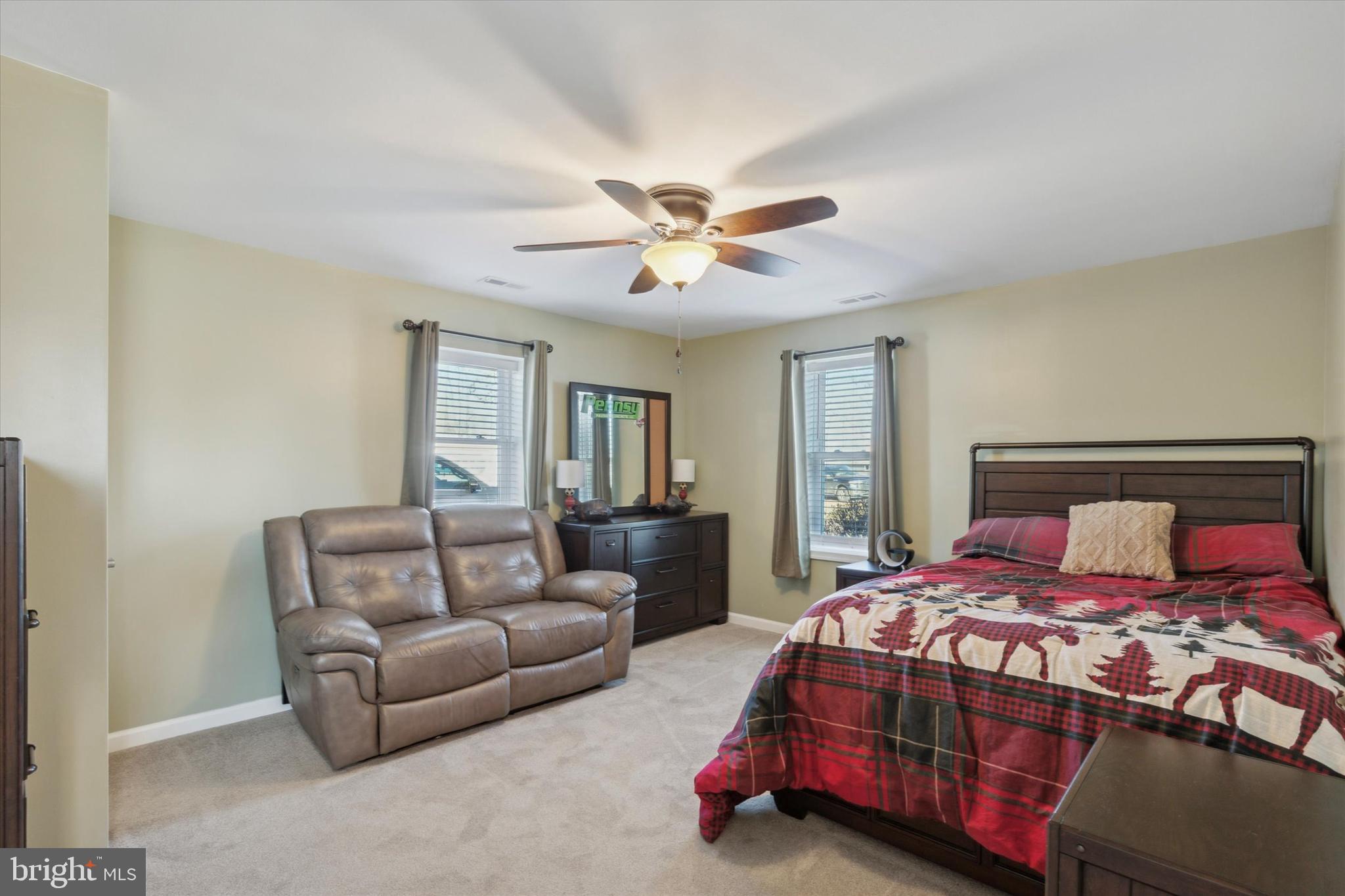 526 Hunsicker Road Telford, PA 18969 - Photo 25 of 35 a bedroom with a bed couch and window