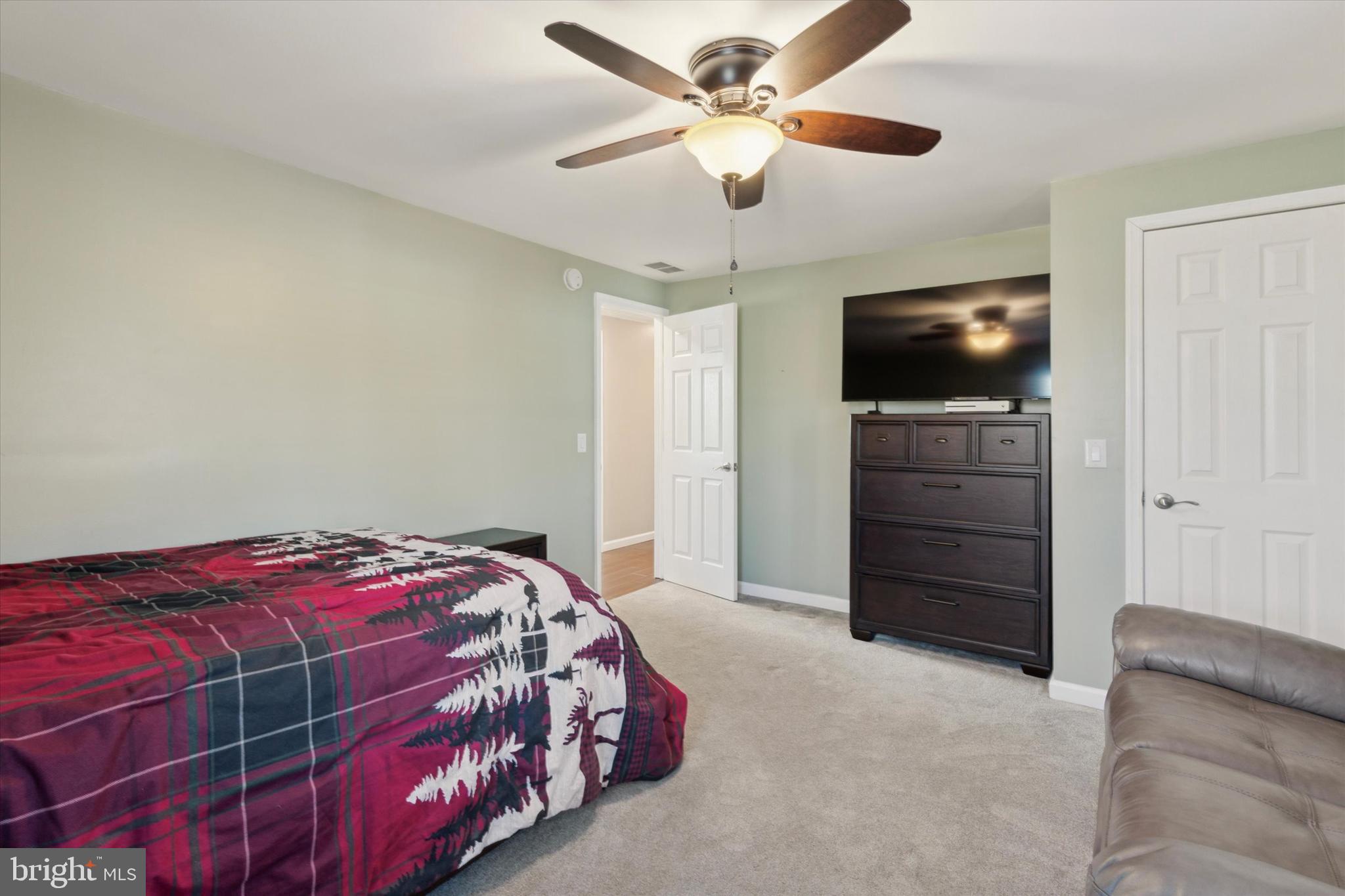 526 Hunsicker Road Telford, PA 18969 - Photo 26 of 35 a bedroom with a bed and a flat screen tv