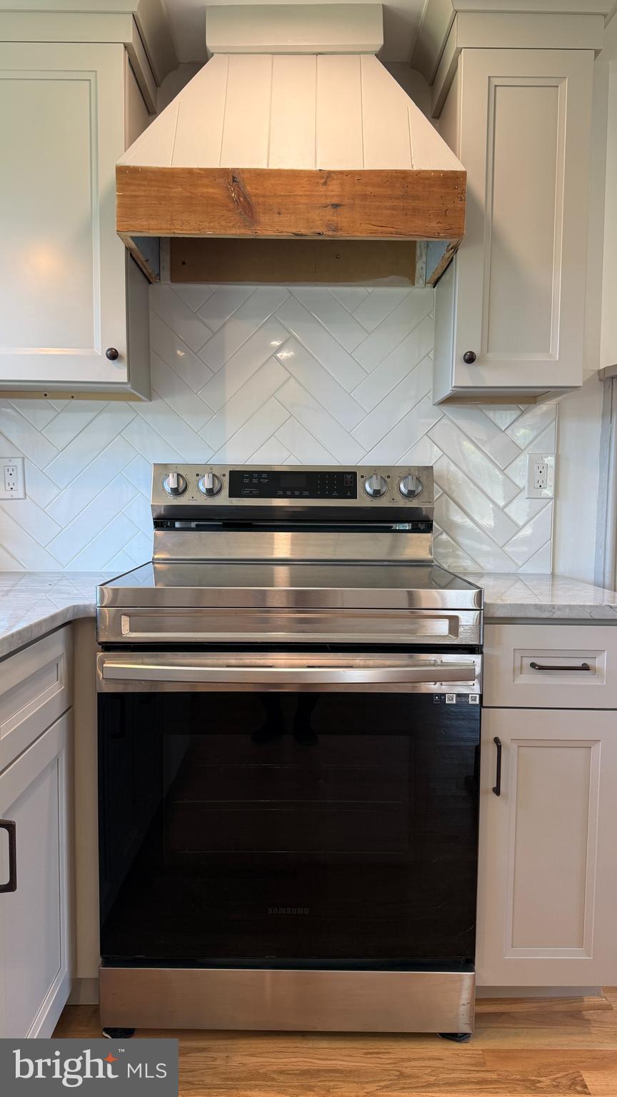 2437 Patane Avenue Abington, PA 19001 - Photo 15 of 69 a stove top oven sitting inside of a kitchen