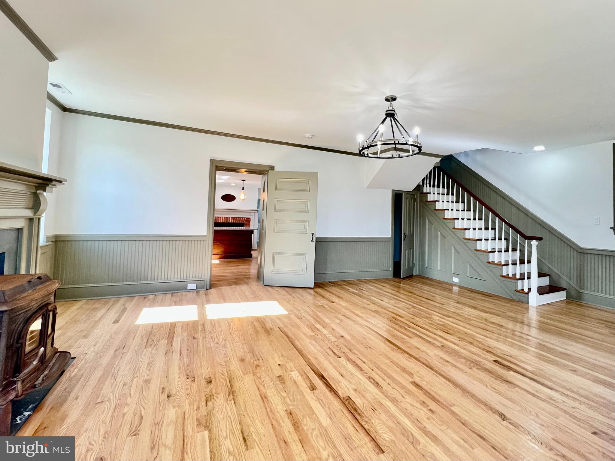 2437 Patane Avenue Abington, PA 19001 - Photo 25 of 69 a view of empty room with stairs and wooden floor